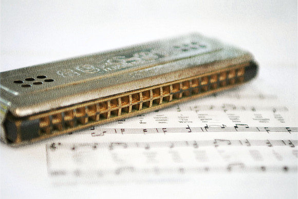 harmonica and a song painted textured